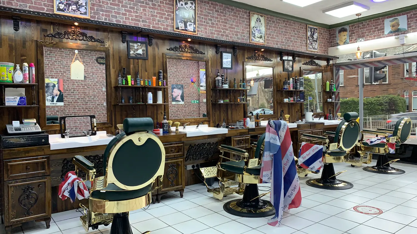Green and gold antique barber chairs inside Marmaris Turkish Barbers, Clarkston